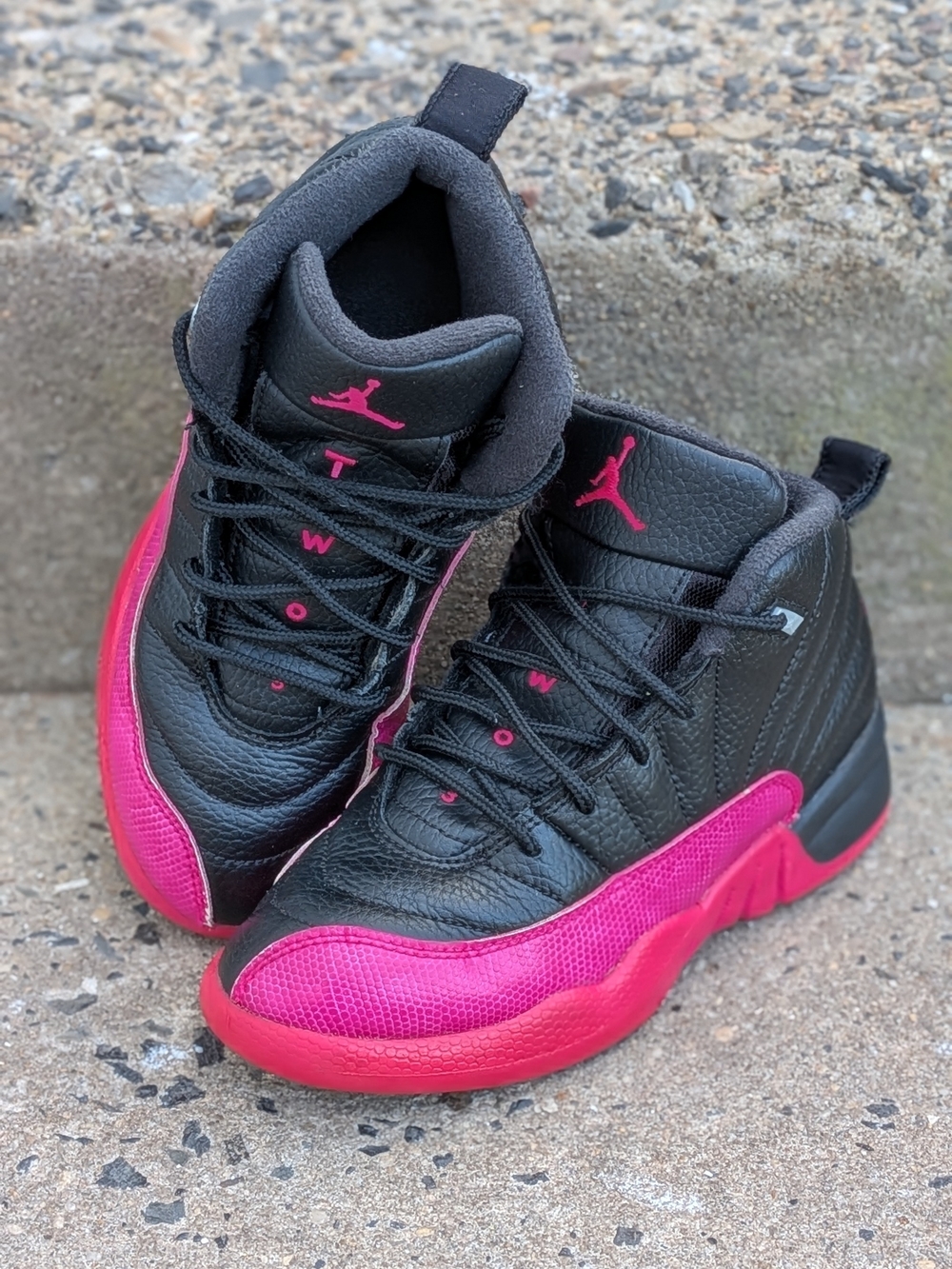 Kids Black and Pink Jordan 12 2y